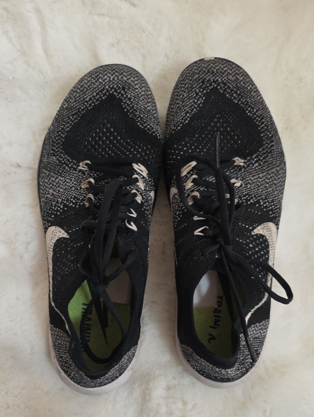 Nike Women’s Black and Gray Flyknit Training Sneakers with White Swoosh